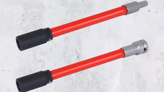 red assembly tool on concrete background